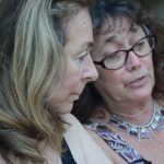 Two people talking