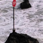 Stop sign in ocean